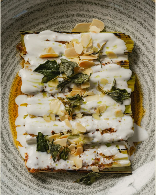 Charred leeks, nduja butter, sheep’s yoghurt and saltbush. 

Smoky, rich and savoury, balanced with the freshness of sheep’s yoghurt and native saltbush.